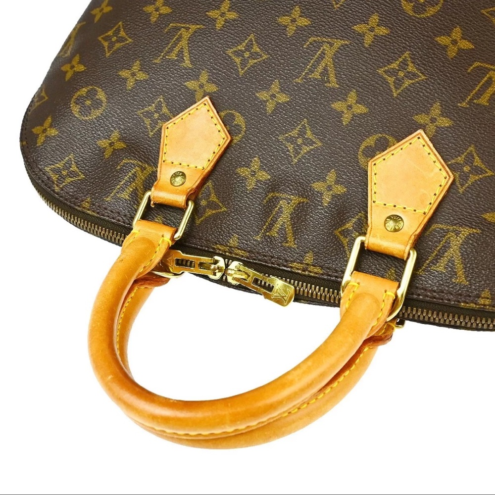 Authentic Louis Vuitton Alma Monogram Handbag - Picture 3 of 9